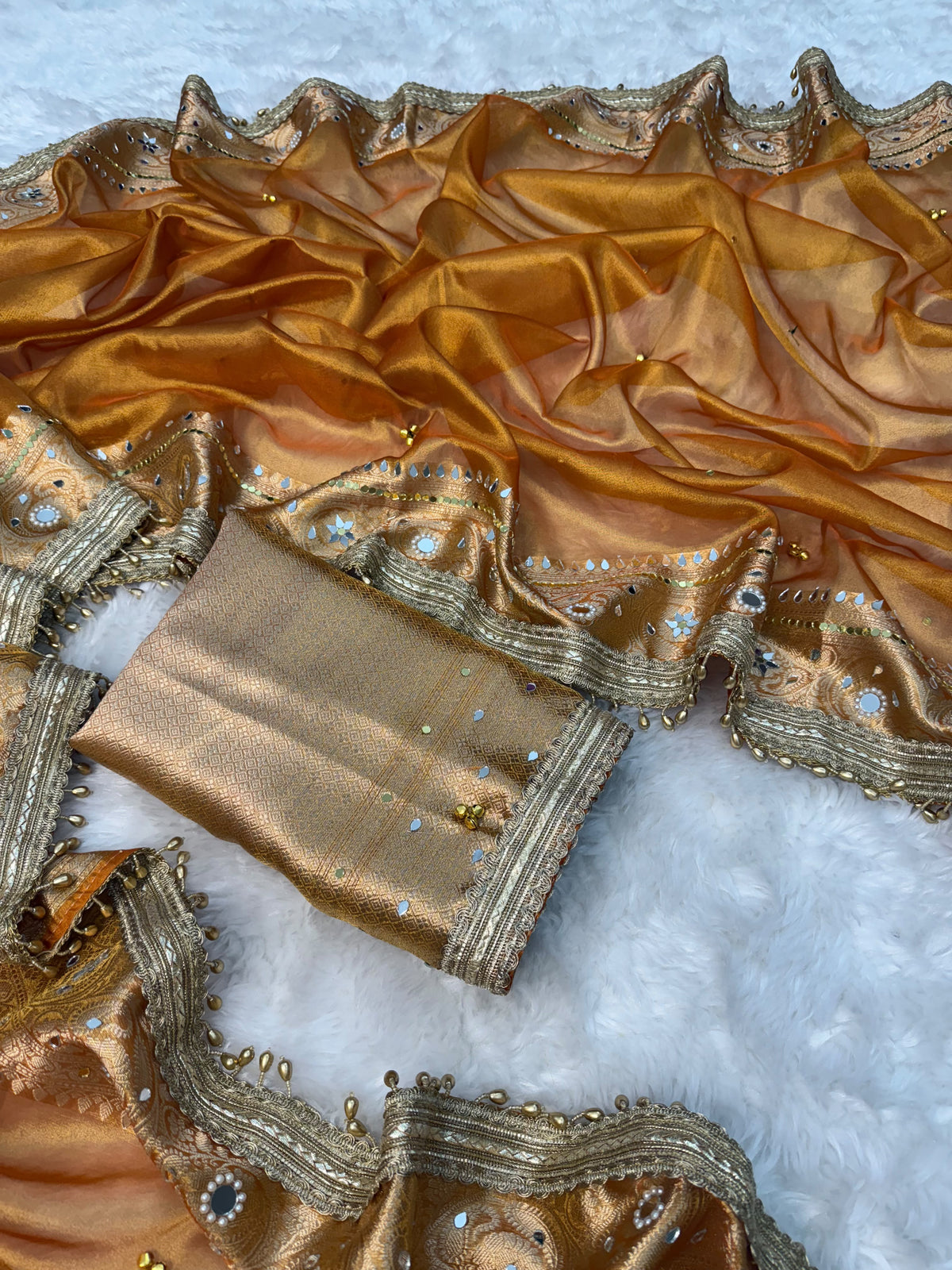 Dusty Orange Viral Ghungroo Saree – Banarasi Soft Tissue Silk | Thesareeghar