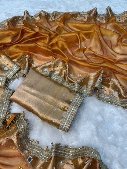 Dusty Orange Viral Ghungroo Saree – Banarasi Soft Tissue Silk | Thesareeghar
